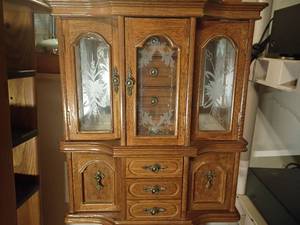 lot 1627 image: Wooden Jewelry Box.  7 drawers, Glass Front, Earring Holders, Necklace Holders and More. Broken knob on right side.    17 x 15.5 x 7