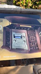 lot 2209 image: Innovative Technology dark mahogany turntable new in box