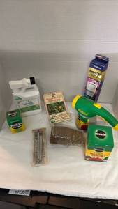 lot 2210 image: Garden Care Supplies, Miracle Grow Plant Food and Pest Control.
