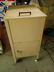 lot 2306 image: Metal Filing Cabinet on Wheels.   With keys.  27 x 14 x 18