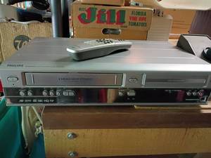 lot 2307 image: Philips DVD and VHS Player with Remote
