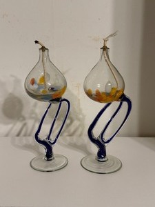 lot 1127 image: Glass Oil Lamps with Blue Twisted Stems and Orange Elements
