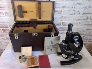 lot 2001 image: Vintage Microscope with Multiple Lenses, Accessories, &amp Wooden Carrying Case