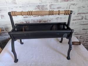 lot 2003 image: Vintage Cast Iron Newspaper Log Roller