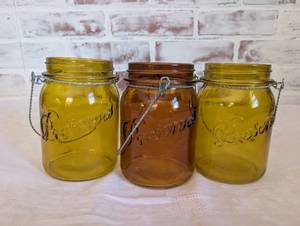 lot 4012 image: Colored Glass Mason Jar Lanterns with Wire Handles - 3 ct