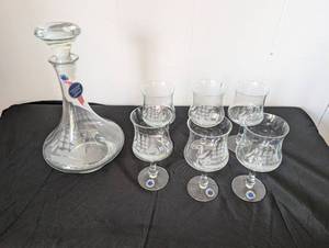 lot 5030 image: Crystal Decanter Set with Matching Glasses - Ship Design
