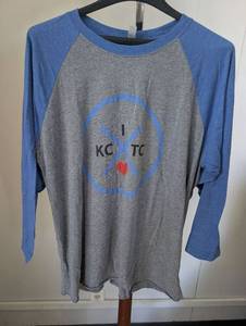 lot 7029 image: Next Level Apparel KC with Heart Raglan Baseball T-Shirt - Size Large