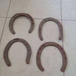 lot 8507 image: Set of Four Used Small Iron Horseshoes