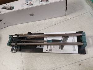 lot 3954 image: Professional Tile Cutter with Chrome Rails - Retail $45