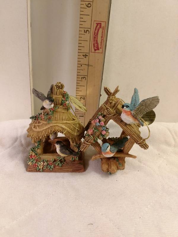 lot 16138 image: Thomas Kinkade Ceramic Wood Thatched Birdhouses