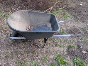 lot 23 image: Black Poly Wheelbarrow with Steel Frame
