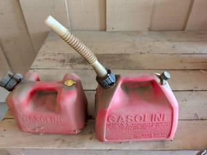 lot 54 image: Red Plastic Gas Can with Spout