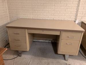 Mid-Century Steel Tanker Desk with 7 Drawers. In Basement