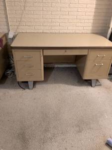 lot 182 image: Mid-Century Modern Executive Office Desk with Multiple Drawers. In Basement