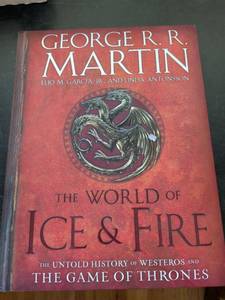 lot 238 image: The World of Ice & Fire by George R.R. Martin Hardcover Book