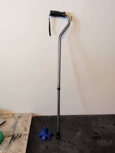 lot 299 image: Adjustable Walking Cane with Ergonomic Handle and Blue Base