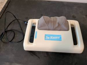 lot 311 image: The Masseur Electric Neck and Shoulder Massage Unit