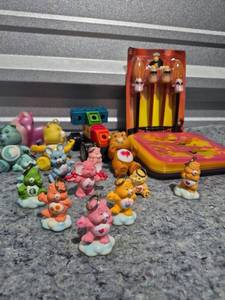 lot 142 image: Mixed Lot of Care Bears Figures Collectibles and Toys - Retail $25