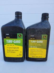 lot 196 image: John Deere Turf-Gard SAE 10W-30 4-Cycle Engine Oil 32 FL OZ - 2 Bottles - One Sealed One Open Uet Near Full - Retail $15