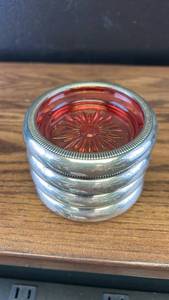 lot 4410 image: Ruby Red Glass Coasters with Silver Rim Set of 4