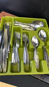 lot 4412 image: MCM Stainless Steel Flatware Set with Floral Pattern