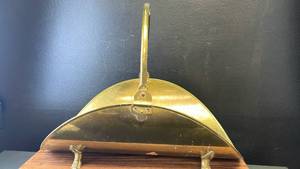 lot 40517 image: Brass Fireplace wood holder  with Decorative Handle