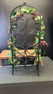 lot 40524 image: Metal Wine Bottle Rack with Grape Vine Decoration