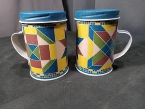 lot 4635 image: Geometric Pattern Salt and Pepper Shaker Set with Blue Lids
