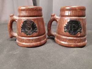 lot 4636 image: Brown Ceramic Salt and Pepper Shakers Set with Dark Medallion Design