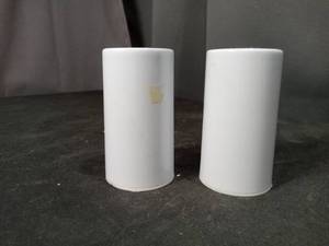 lot 4637 image: White Ceramic Salt and Pepper Shakers Set