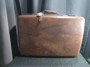 lot 4576 image: Brown Hard Shell Suitcase with White Quilted Interior