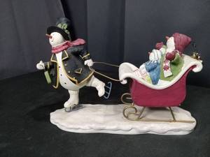 lot 4588 image: Jolly Follies Snowman Sleigh Ride Figurine by Sandi Gore Evans