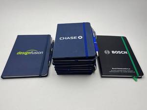 lot 105 image: Lot of 10 Branded Corporate Notebooks with Pens