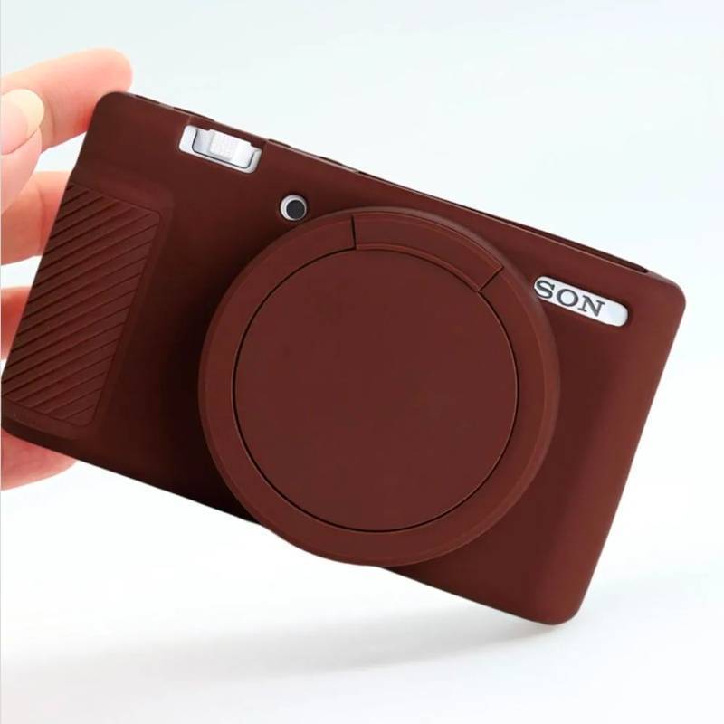 lot 70707 image: Camera Case for Sony ZV-1,ZV1 Camera Soft Case Cover Rubber Camera Sleeve with Removable Lens Cover,Anti-Scratch Slim Fit Soft Sleeve with ZV1 Screen Protector and Strap Wrist. (Coffee) - Retail $15