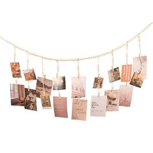 lot 10221 image: WIVKFML Hanging Photo Display with 18 Wood Clips, Boho Wooden Bead Wall D�cor for Bedroom, Living Room, Dorm, Kids Art Picture Display