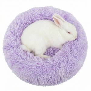 lot 16111 image: Tiny Dog Bed 11.8 Inch for Extra Small Dogs,Washable Puppy Bed,Soft Faux Fur Calming Donut Bed for Chihuahua Yorkie Maltese Pomeranian,Purple and White