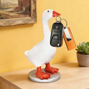 lot 19093 image: Losneg Magnetic Desk Goose Key Holder, 7.28 in Funny Home Desktop Decor Cute Goose Resin Statue Office Table Decor Housewarming Gifts for Mother Women and Men 1 Pack (BASE BROKEN FROM FEET)