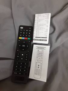 lot 317 image: Universal TV Remote Control with Manual and Code List - Retail $8