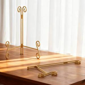 lot 343 image: HEMYLU Gold Plate Stand, 12 Inch Decorative Holder for Displaying Platters, Heavy-Duty Metal Easel Stand for Picture, Photo Frame, Books and Round Objects, 2-Packs - Retail $12