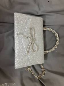 lot 442 image: LJMBOEN Women Evening Bag Sparkly Bow Clutch Purses Wedding Glitter Rhinestone Clutch Bags Dressy Handbags for Party, Prom (Silver) - Retail $22