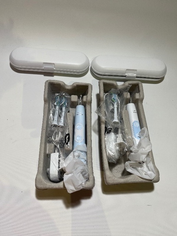 lot 103 image: PHILIPS Sonicare Optimal Clean - His & Hers Blue & White Toothbrush Pair - Charger Case Heads Included (2 Devices) - comes as is