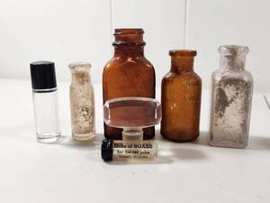 lot 83 image: Old Glass Apothecary Bottles Collection with Magnifying Glass