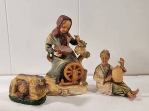 lot 104 image: Hand Painted Ceramic Figurine Set - Woman with Spinning Wheel and Man with Birdcage