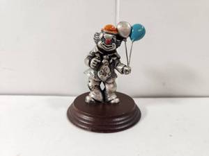 lot 112 image: Pewter Clown Figurine with Balloons on Wooden Base