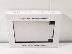 lot 151 image: ChargeCard Credit Card Size Portable Phone Charger 2300mAh Power Bank