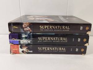 lot 325 image: Supernatural Complete Season 1, 2, and 7 DVD Set