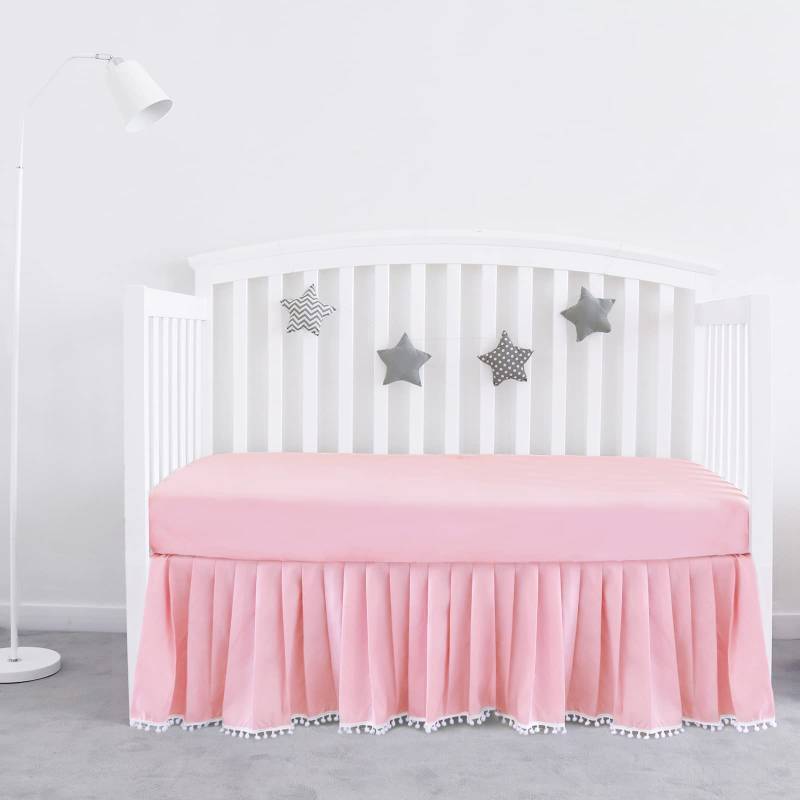 lot 50665 image: Pink Crib Skirt Pleated with White Lovely Pompoms, Bedding Dust Ruffle for Girls, 14 Drop, Fit All Standard Crib Bed, Fade Resistant Crib Bed Skirt Machine Wash - Retail $25