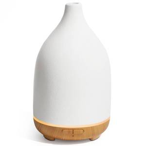 lot 29425 image: InnoGear Oil Diffuser, 150ML Ceramic Diffuser for Essential Oils Handcrafted Aromatherapy Diffuser Ultrasonic Cool Mist Humidifier with 2 Mist Modes Waterless Auto Off for Room Office, White - Retail $25