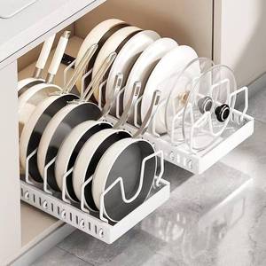lot 44107 image: Pull Out Pots and Pans Organizer for Cabinet & Countertop, Kitchen Cabinet Organizer with 8 Adjustable Dividers, Storage for Pot Lid, Dishes, Bakeware, White - Retail $40