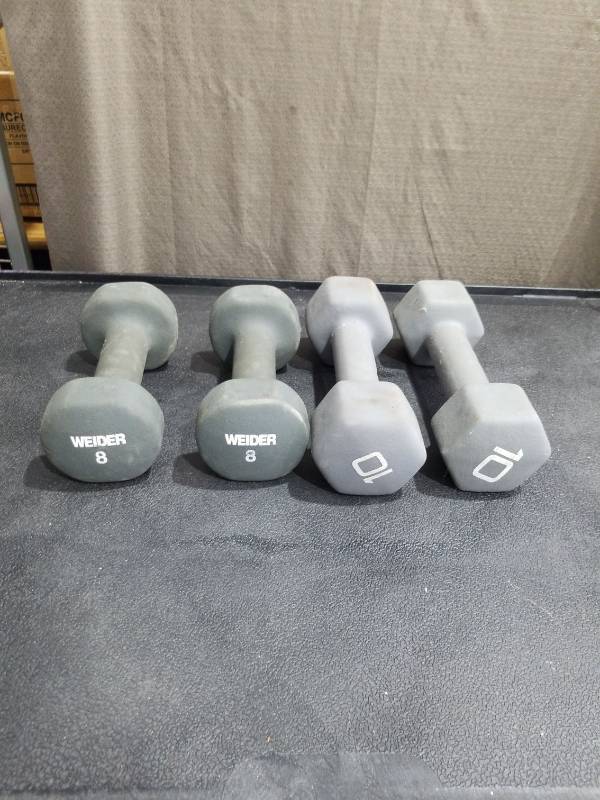 lot 4254 image: SET OF 8 AND 10 POUND DUMBBELLS